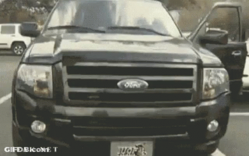 Black Ford Truck Parked In Lot GIF