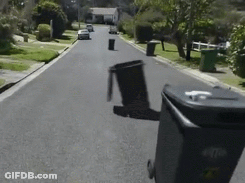Black Garbage Can With Letter T GIF