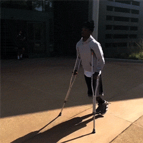 Black Girl Guy Run Crutches GIF