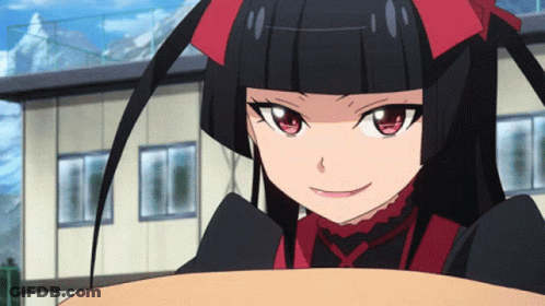 Black Haired Girl With Red Eyes Smiling Near Building GIF