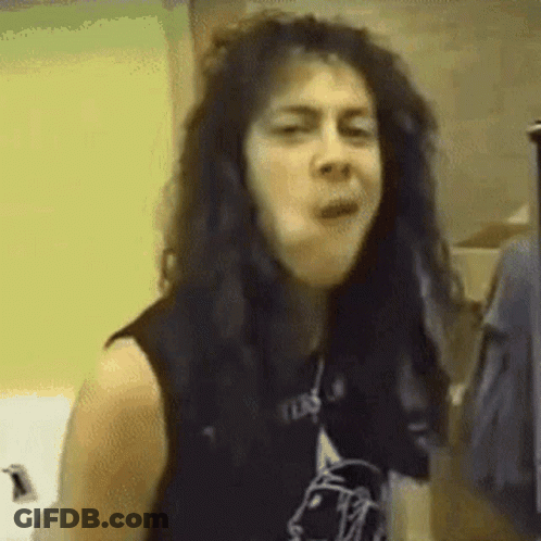 Black Haired Woman Making Funny Face Black Vest GIF