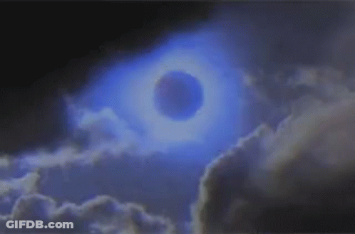 Black Hole In Sky With Clouds GIF