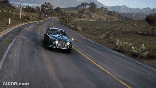 Black Jaguar Driving Beside White Van GIF