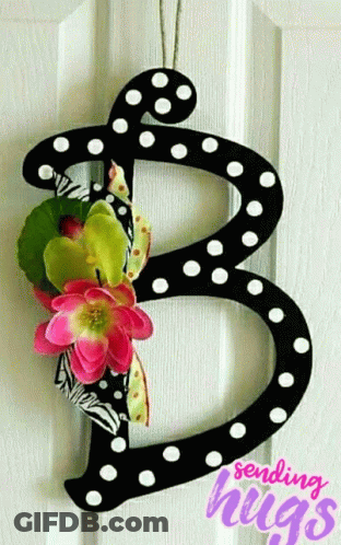 Black Letter B With White Polka Dots And Pink Flowers On Door GIF