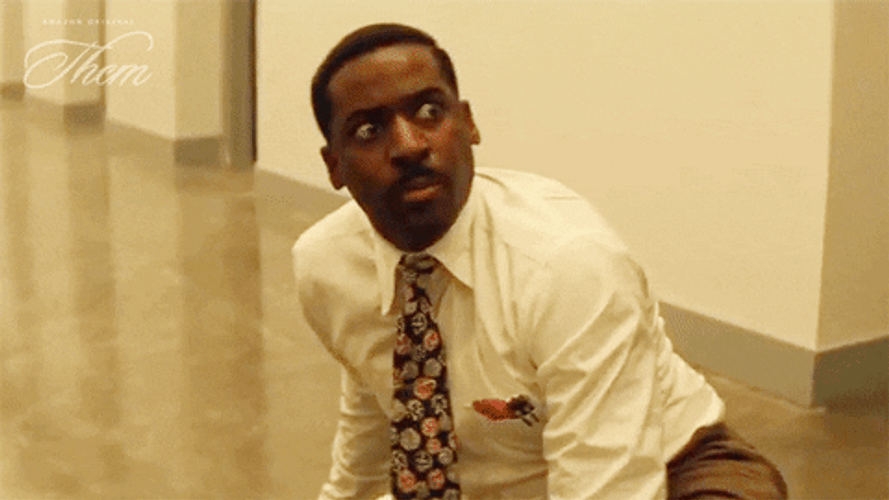 Black Man Looking Away Covering Eyes GIF