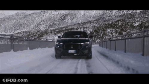 Black Maserati Driving On Snowy Road With BX JZWN Plate GIF