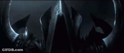 Black Object In Dark With Light Shining GIF