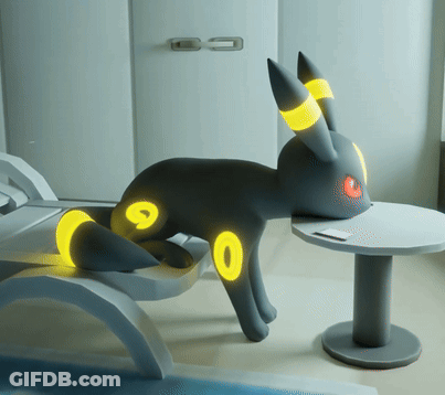 Black Rabbit With Yellow Circles Lying GIF