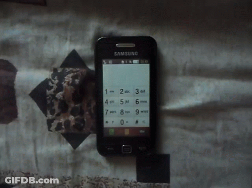 Black Samsung Phone On Bed GIF