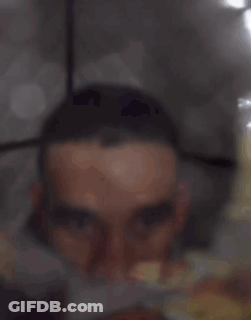 Black Shirt And Hat Man Talking Pay Per View Sign GIF