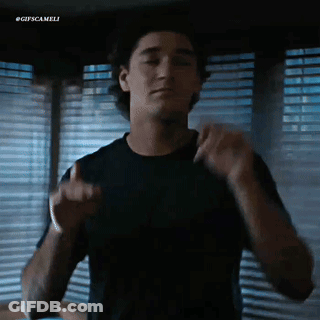 Black Shirt Man Dancing By Window Blinds GIF