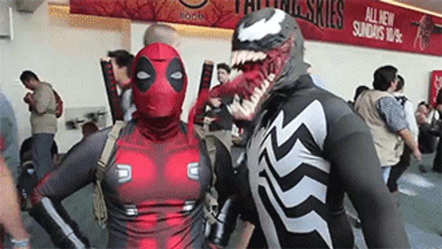 Black Spiderman Cosplay Licking Deadpool GIF