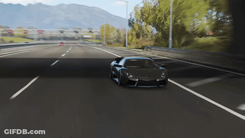 Black Sports Car Driving Down Highway With Mountains GIF