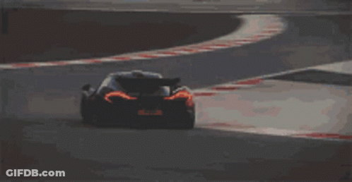 Black Sports Car On Curvy Track GIF