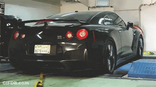 Black Sports Car With License Plate 6679 KK8 GIF