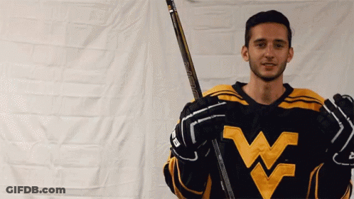 Black-Yellow Jersey Man Holding Hockey Stick W GIF