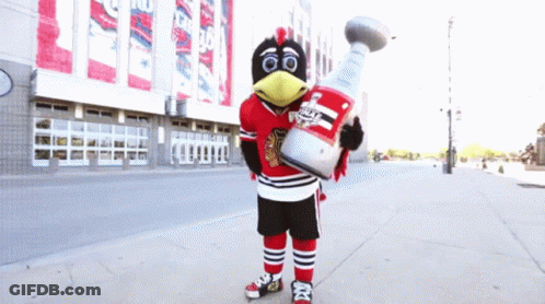 Blackhawks Mascot Holding Large Trophy GIF