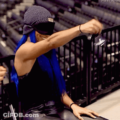 Blind-Folded Girl Bell Ringing GIF