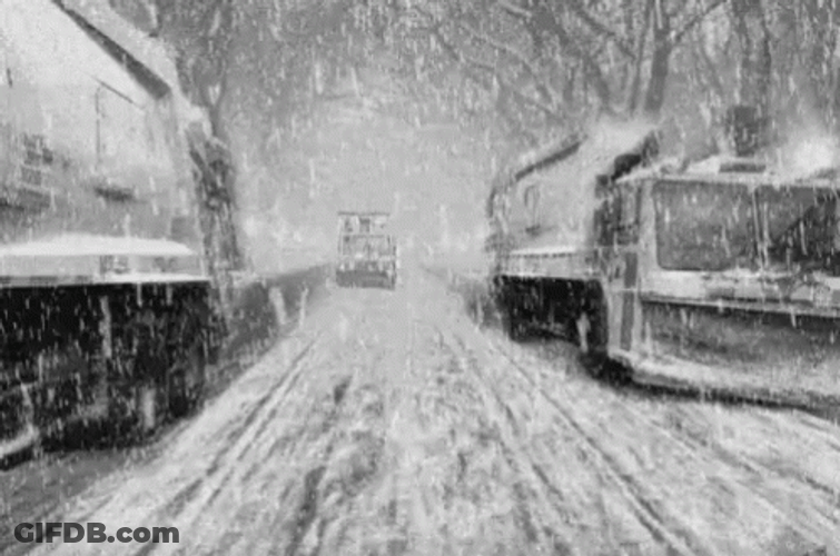 Blizzard Heavy Trucks Travelling Icy Road GIF