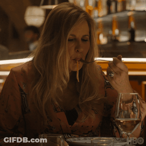 Blond Woman Eating Noodles GIF