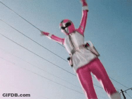 Blonde Anime Girl Lifting Dumbbells In Front Of Keyboard GIF