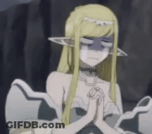 Blonde Anime Girl Sitting With Hands Folded In Prayer GIF