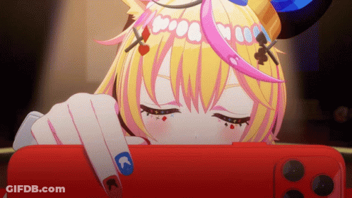 Blonde Anime Girl With Horns Looking At Red Phone GIF