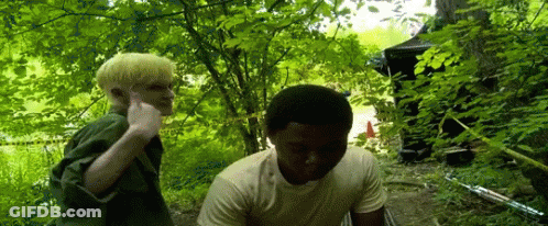 Blonde Boy Standing Next To Black-Haired Boy GIF