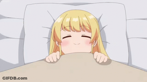 Blonde Cartoon Girl Laying In Bed With Mouth Open GIF