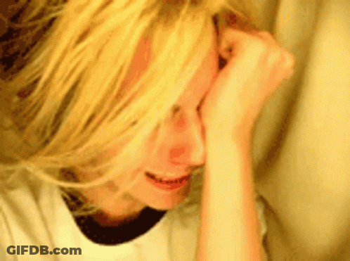Blonde Girl Crying Hands On Face GIF
