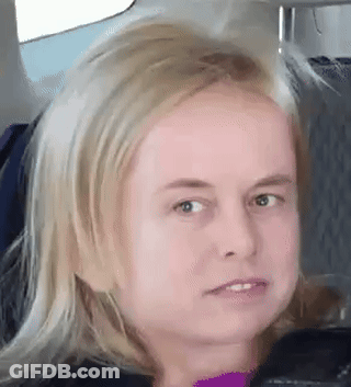 Blonde Girl Funny Face In Car GIF