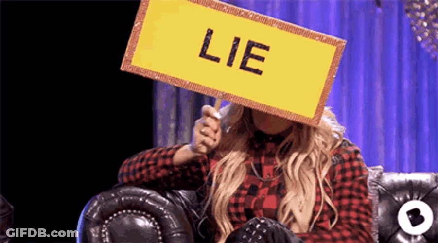 Blonde Girl Holding A Liar Card GIF