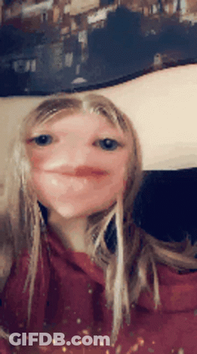 Blonde Girl In Red Hoodie Making Funny Face GIF