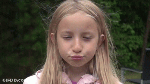Blonde Girl Making Funny Face GIF