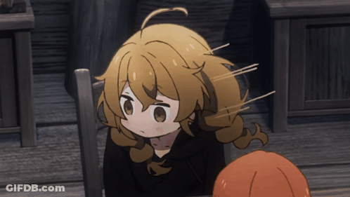 Blonde Girl Sitting At Table GIF