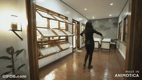 Blonde Girl Standing Next To Another Girl GIF