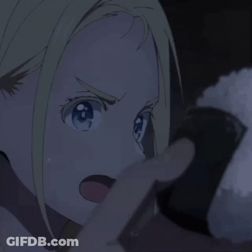 Blonde Girl With Blue Eyes Holding Rice Ball GIF