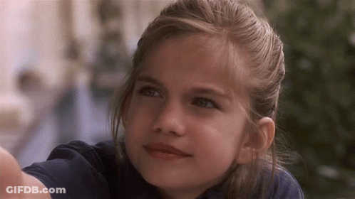 Blonde Girl With Blue Eyes Looking Up GIF