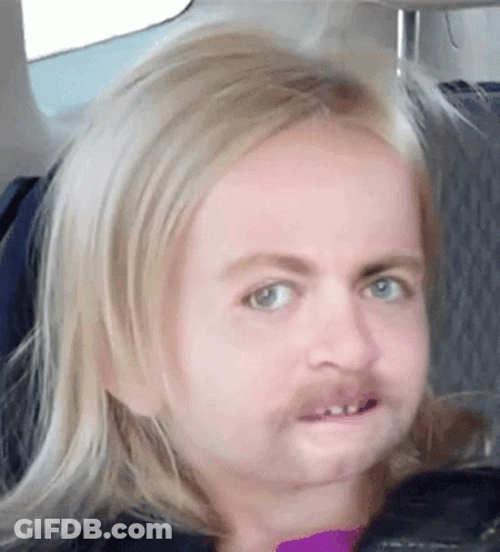 Blonde Girl With Fake Mustache Making Funny Face GIF