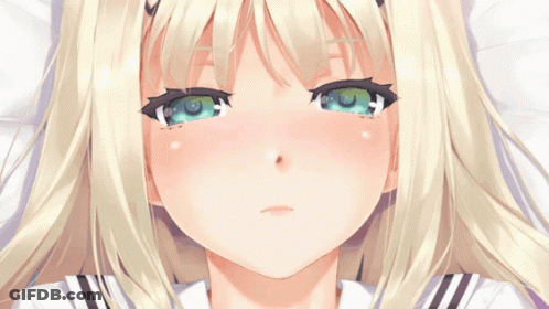 Blonde Girl With Green Eyes Laying On Bed GIF
