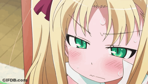Blonde Girl With Green Eyes Making A Face GIF