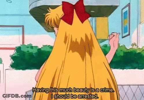 Blonde Girl With Red Bow Says Having This Much Beauty Is A Crime GIF