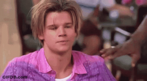 Blonde-Haired Man In Pink And Purple Shirts GIF