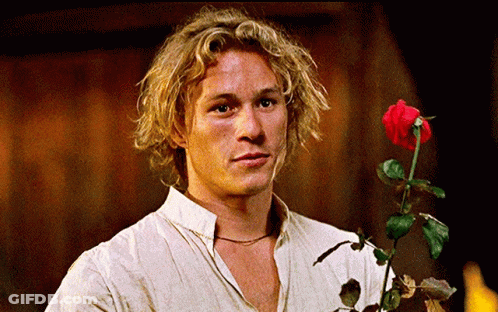 Blonde Man Holding Red Rose GIF