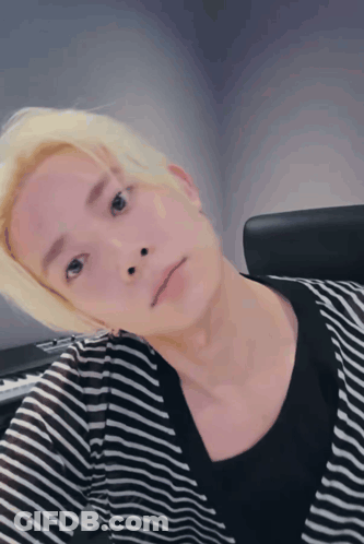Blonde Man In Striped Shirt Taking Selfie GIF