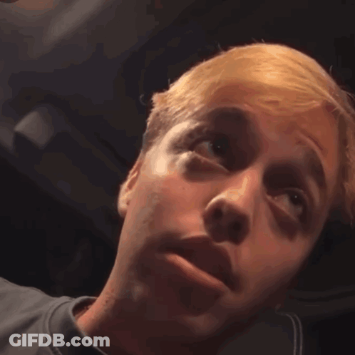 Blonde Man Looking At Camera GIF