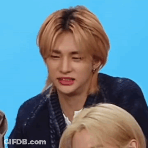 Blonde Man Making Funny Face Beside Woman GIF