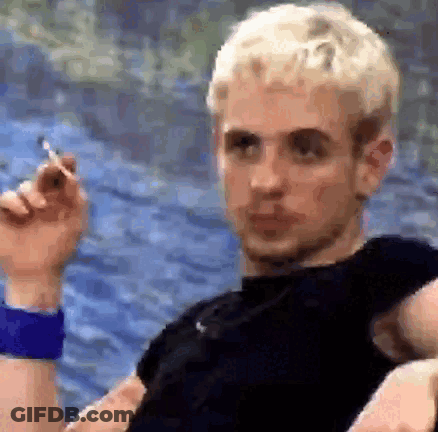 Blonde Man Smoking Cigarette GIF