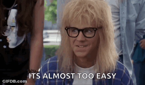 Blonde Man With Glasses, Plaid Shirt, And Wig GIF