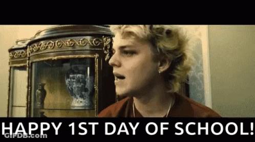 Blonde Man With Happy 1St Day Of School Sign GIF